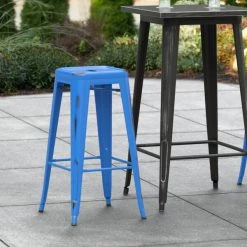LT&S Alloy Series Lancaster Table & Seating Alloy Series Distressed Blue Stackable Metal Indoor / Outdoor Industrial Barstool With Drain Hole Seat