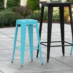 LT&S Alloy Series Lancaster Table & Seating Alloy Series Arctic Blue Stackable Metal Indoor / Outdoor Industrial Barstool With Drain Hole Seat