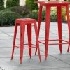 LT&S Alloy Series Lancaster Table & Seating Alloy Series Distressed Red Stackable Metal Indoor / Outdoor Industrial Barstool With Drain Hole Seat