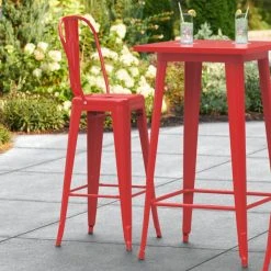 LT&S Alloy Series Lancaster Table & Seating Alloy Series Red Metal Indoor / Outdoor Industrial Cafe Barstool With Vertical Slat Back And Drain Hole Seat
