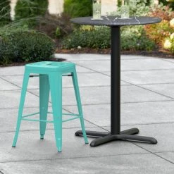 LT&S Alloy Series Lancaster Table & Seating Alloy Series Seafoam Stackable Metal Indoor / Outdoor Industrial Cafe Counter Height Stool With Drain Hole Seat